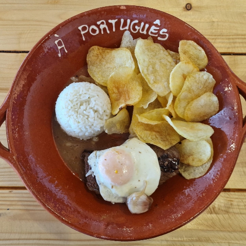 À Português